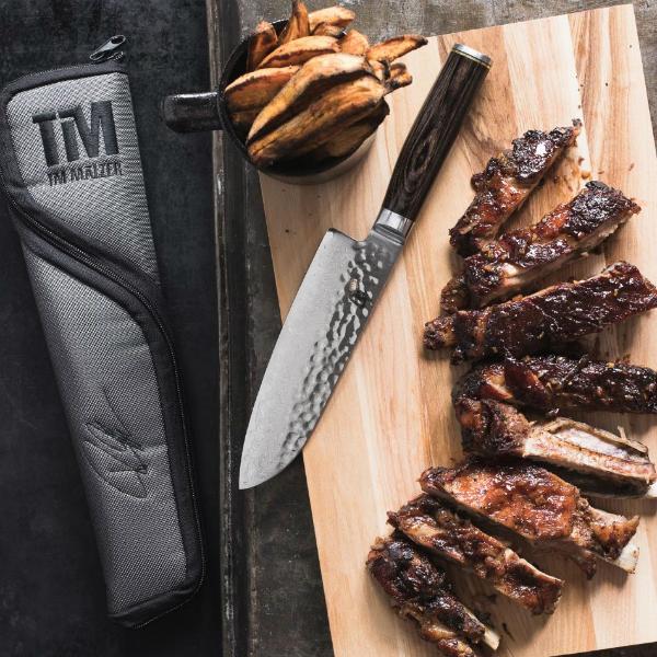 3-teiliges Premier Tim Mälzer Geschenkset von KAI Shun mit Santoku, Textilmessertasche und Schneidbrett KAI Shun Premier Tim Maelzer 3-teiliges Geschenkset