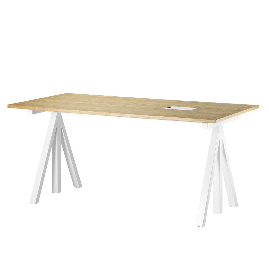 Kleines Arbeitszimmer einrichten: wenig Fläche optimal nutzen 5 Kleines Arbeitszimmer einrichten: STRING FURNITURE hat neben Regalen auch funktionale Schreibtische wie den Works zu bieten.